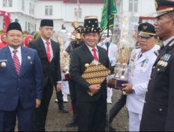 Penyerahan Tunggul Kecamatan Terbaik, Pj Gubsu: Motivasi bagi Bupati dan Camat
